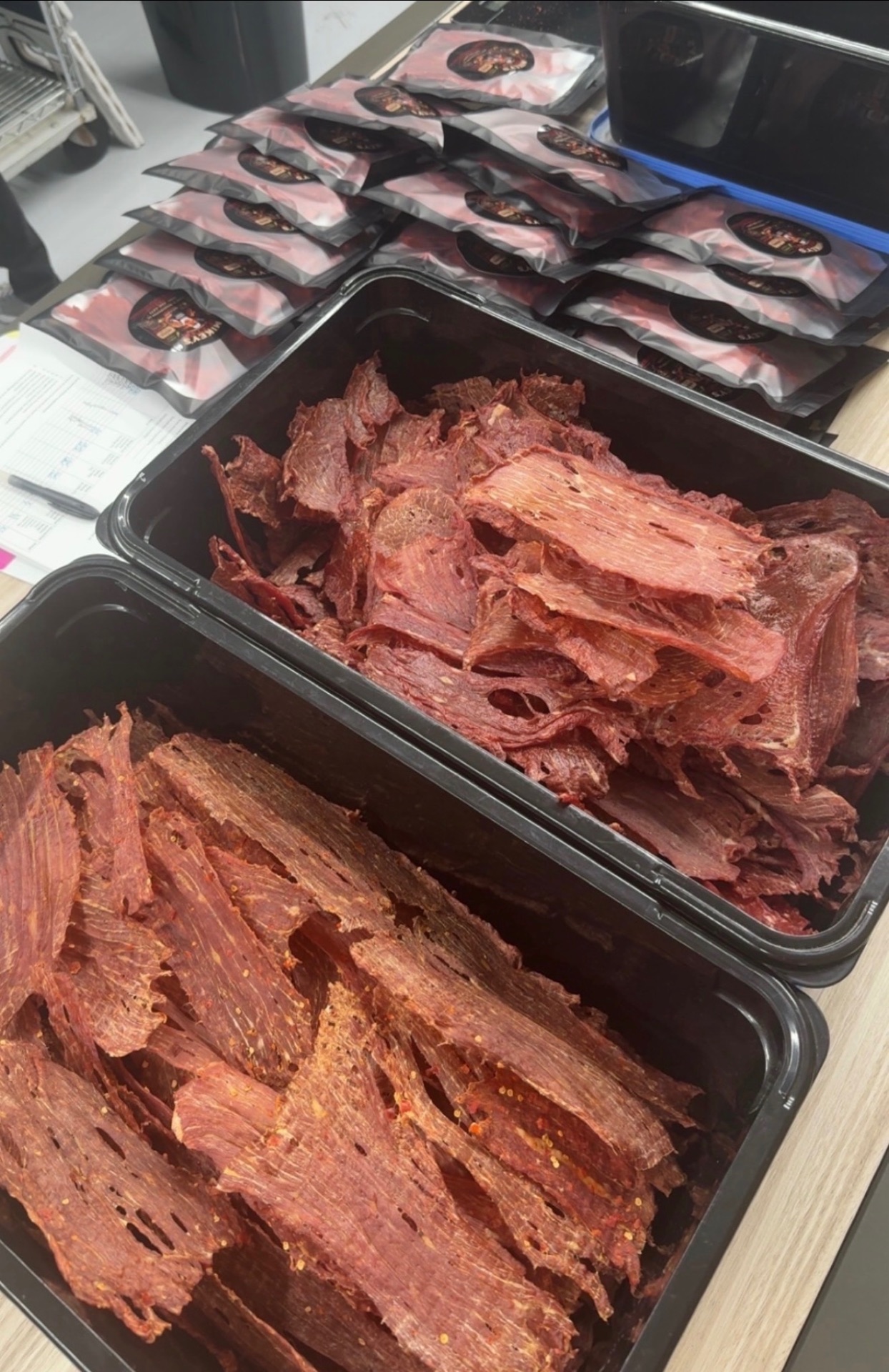 Hand-packed Mikey's Jerky bags ready to ship